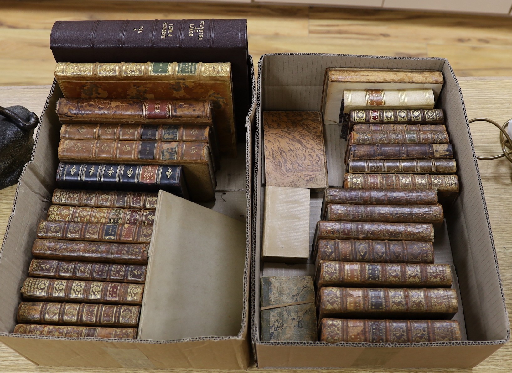 A selection of 18th and 19th century leather bound books